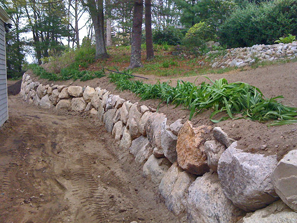 Stone retaining wall.