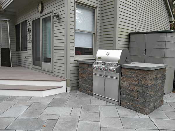 Masonry with built-in gas grill.
